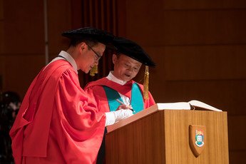 Dr Jack MA signs the Register of the Honorary Degree Graduates