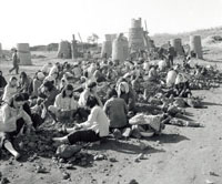 October 1958, Breaking stones for the backyard furnaces in Baofeng county, Henan.
