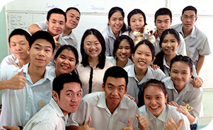 PhD student April Liu Yiqi with her Grade 12 class in the bilingual school in Thailand
