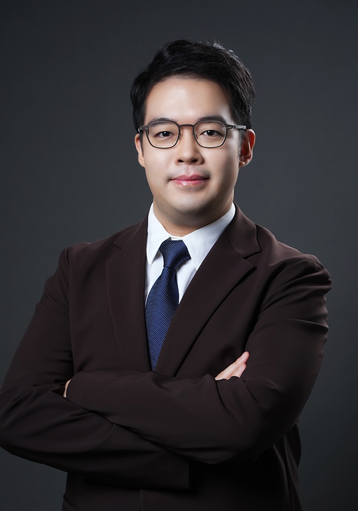 Dr. Alex T. L. Leong