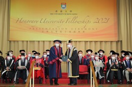 Pro-Chancellor Dr the Honourable Sir David Li Kwok-po (right) presents the Honorary University Fellowship to Mr Anthony Cheung Kee-wee (left).