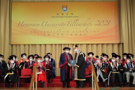 Pro-Chancellor Dr the Honourable Sir David Li Kwok-po (right) presents the Honorary University Fellowship to Mr Henry Wai Wing-kun (left).