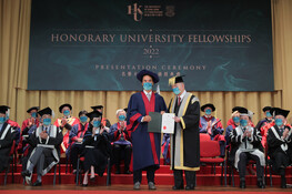 Pro-Chancellor Dr the Honourable Sir David Li Kwok-po (right) presents the Honorary University Fellowship to Dr Adrian Cheng Chi-kong (left).