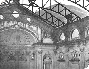 An interior view of the roofless Great Hall in the Main Building, taken after the World War II.